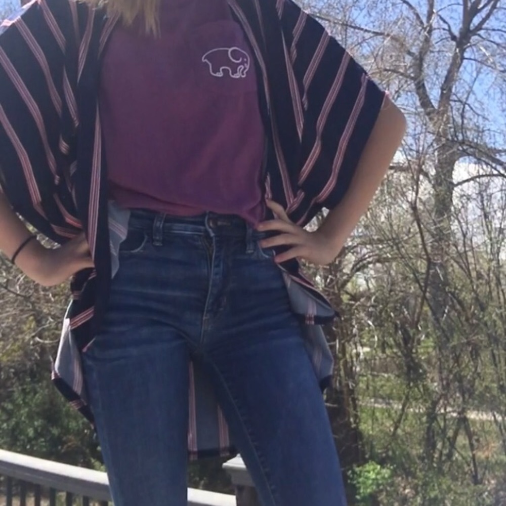 Red white and blue striped poncho sweeter.